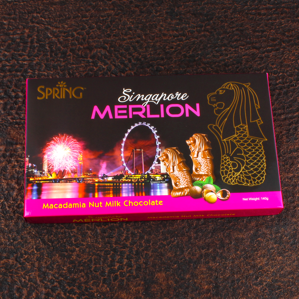 Pearl Rakhi with Spring Merlion Macademia Nut Milk Chocolates