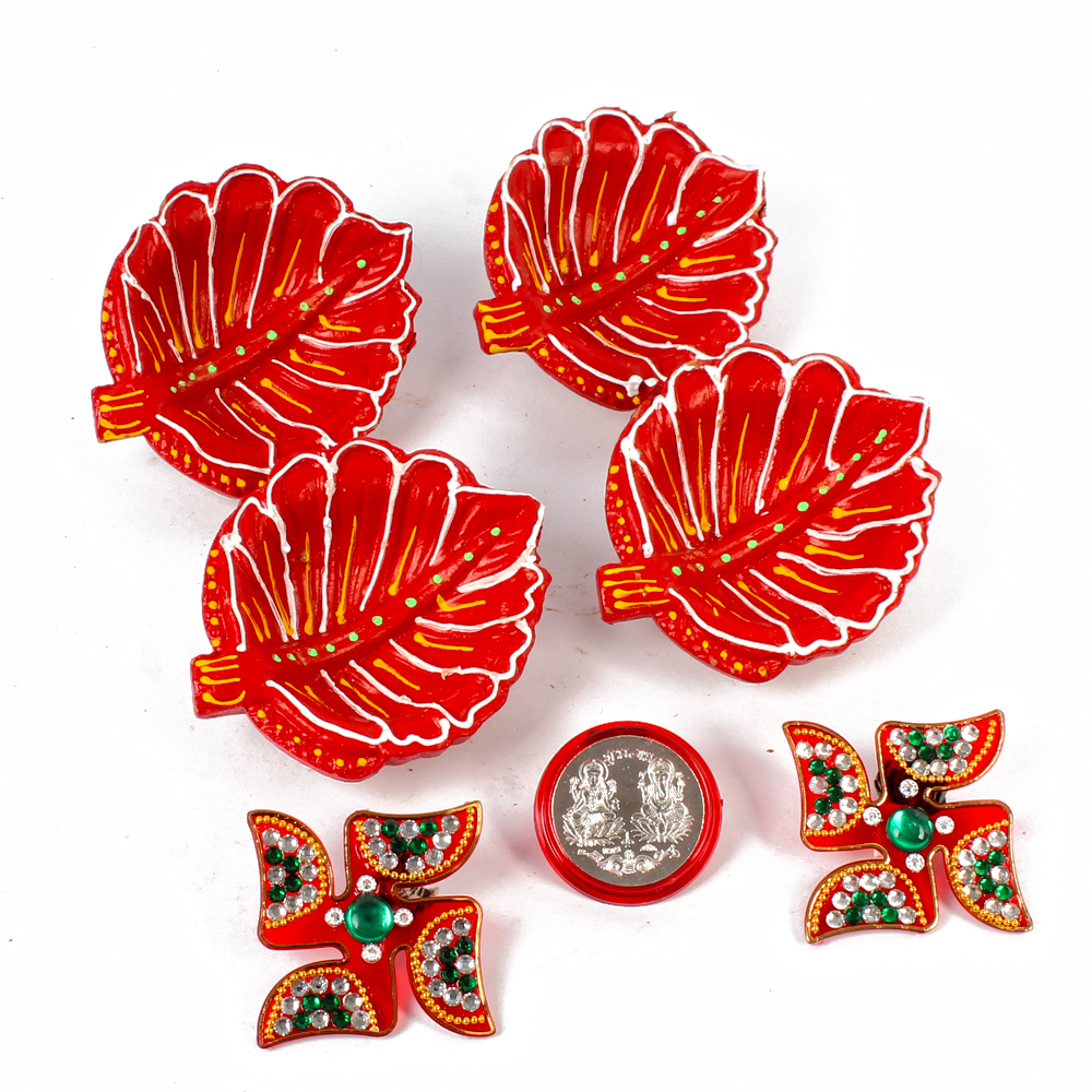 Leaf Shaped Diyas with Shubh Swastika and Silver Plated Lakshmi Ganesha Coin.