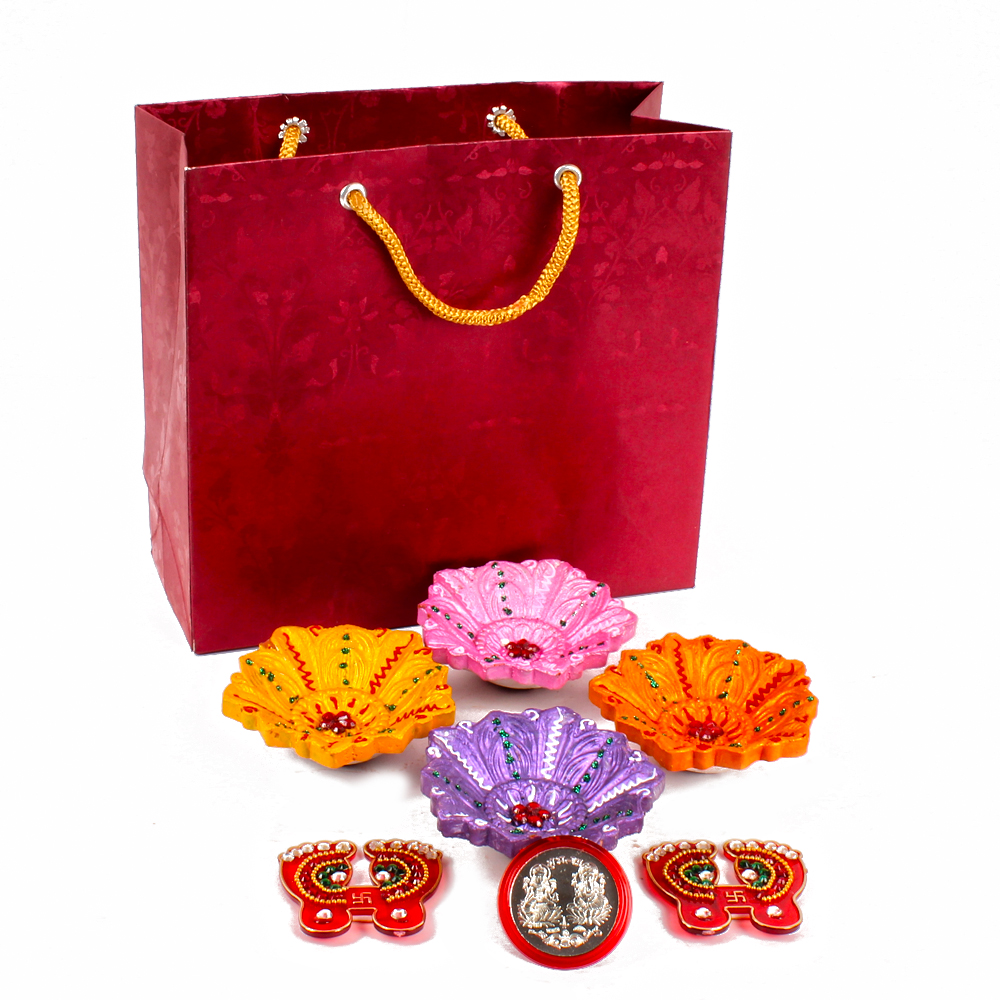 4 Diyas with Shubh Pagla and Silver Plated Lakshmi Ganesha Coin in a Gift Bag