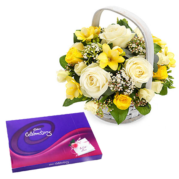 Beautiful basket of yellow and white roses with Celebration pack