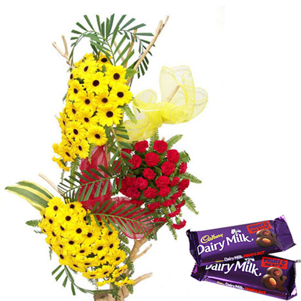 Heighted arrangement with Chocolates.