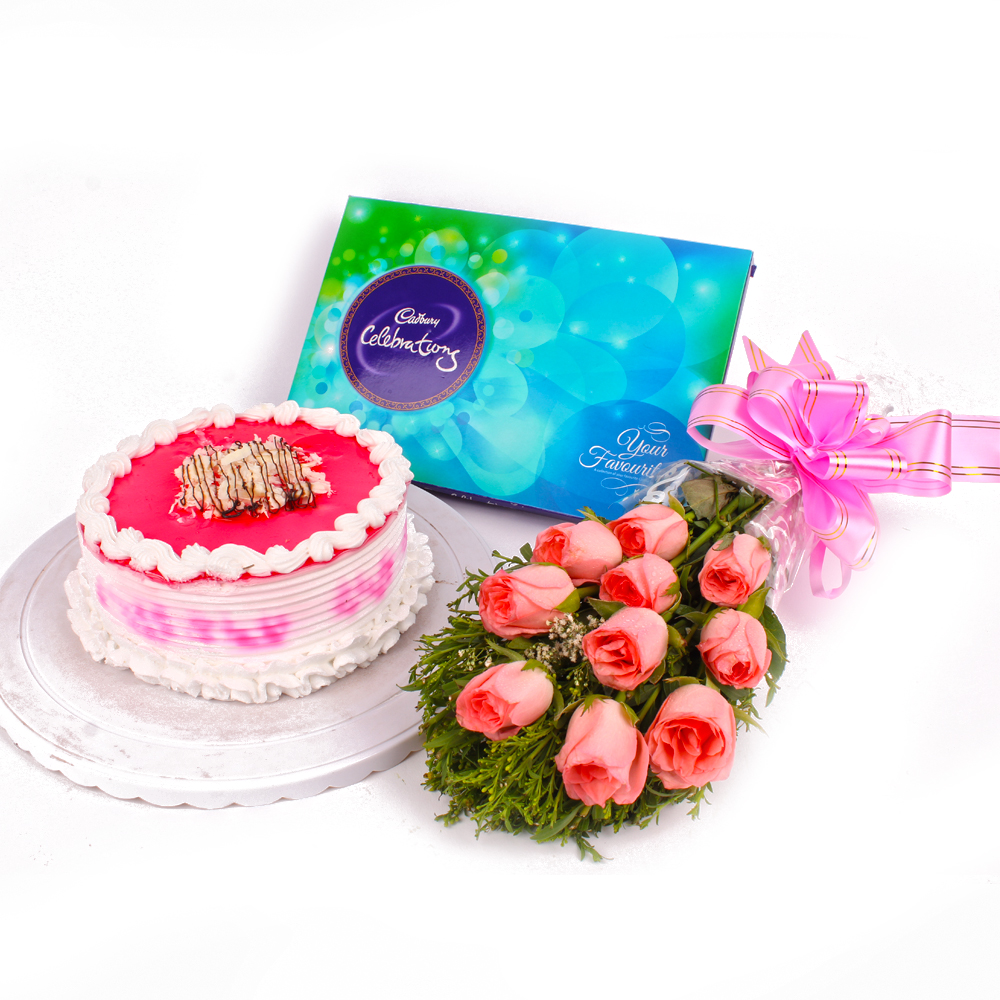 Strawberry Cake with Cadbury Celebration and Pink Roses Bunch