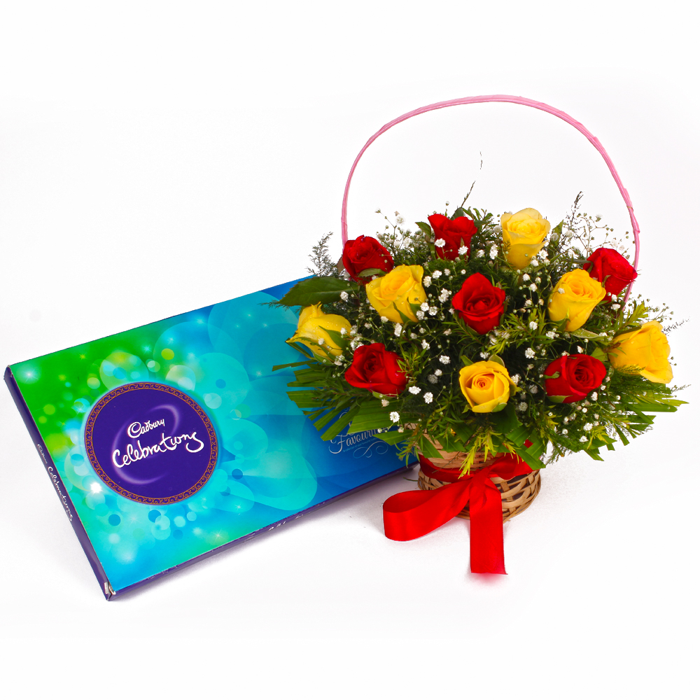 Basket of Twelve Red and Yellow Roses with Cadbury Celebration Chocolates