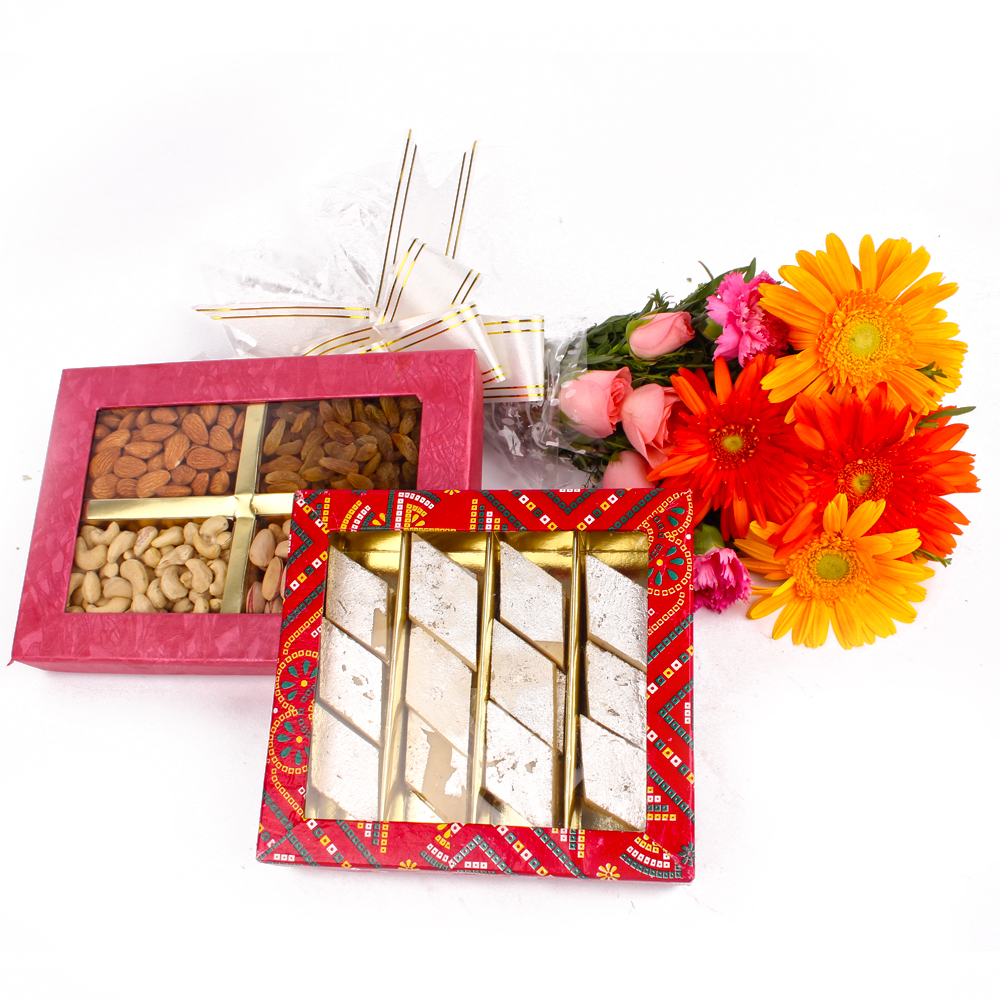 Assorted Dryfruits with Kaju Barfi and Seasonal Fresh Flowers