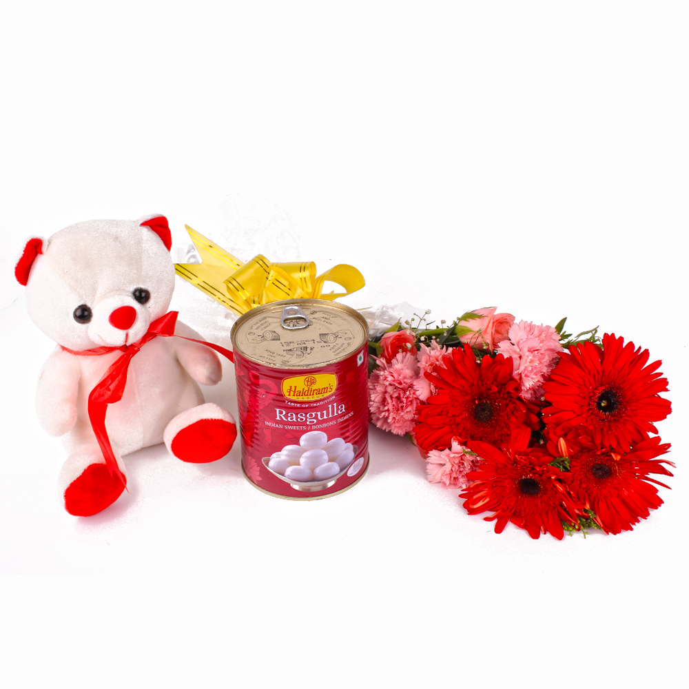 Rasgulla with Fresh Carnations and Gerberas Bouquet with Soft Toy Combo