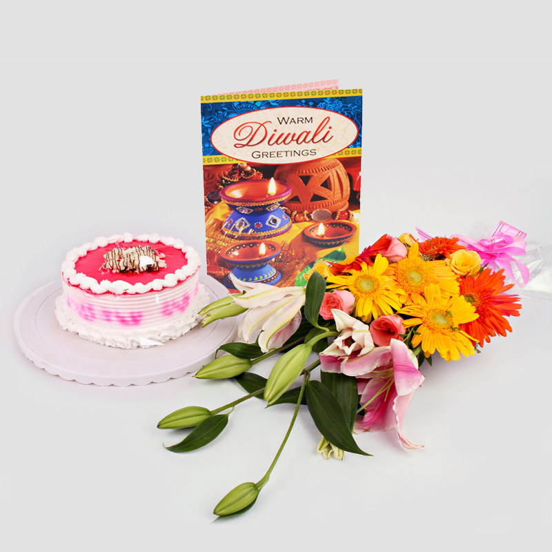 Diwali Gift of flowers and half kg Strawberry Cake with Diwali Greeting Card