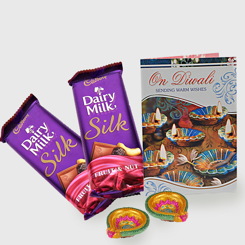 Diwali Hamper of Cadbury dairy milk silk with card and diya