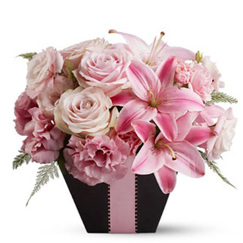 Basket of Exotic pink flowers