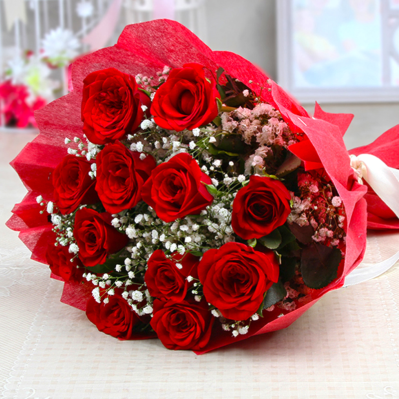 Loveable Twelve Red Roses Bouquet With Tissue Wrapping Best Price