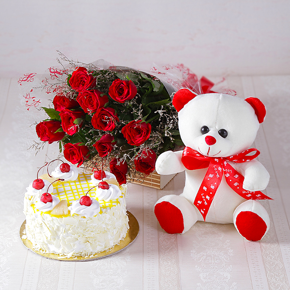 Forever Red Roses with Half kg Pineapple cake and Soft Toy