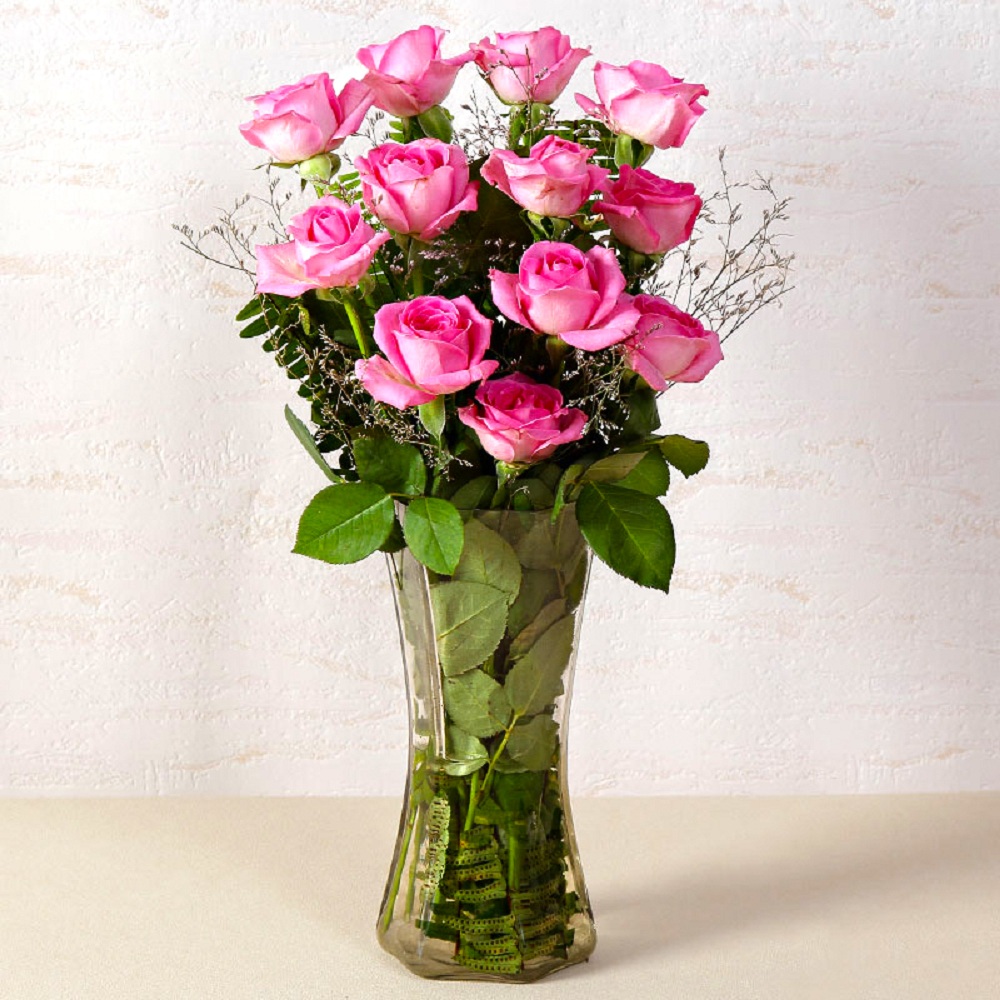 Dozen Pink Roses In Glass Vase