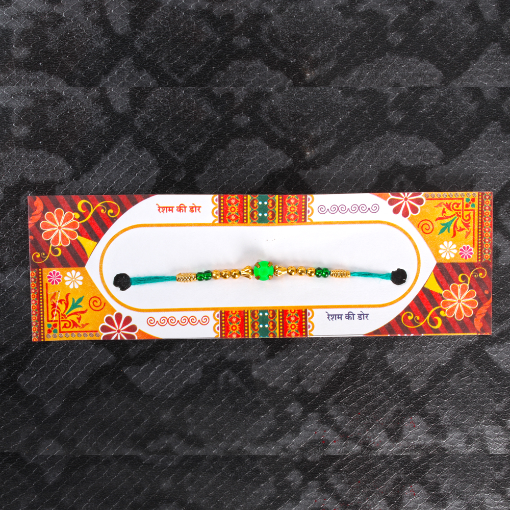 Sweetness of Chamcham with Rakhi Thread and Rakhi Greeting Card