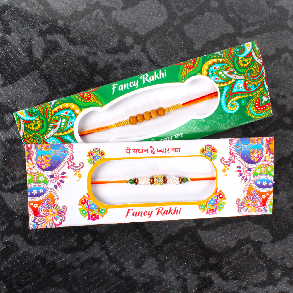 Rakhis with Rajbhog Sweet and Laxmi Ganesha Coin