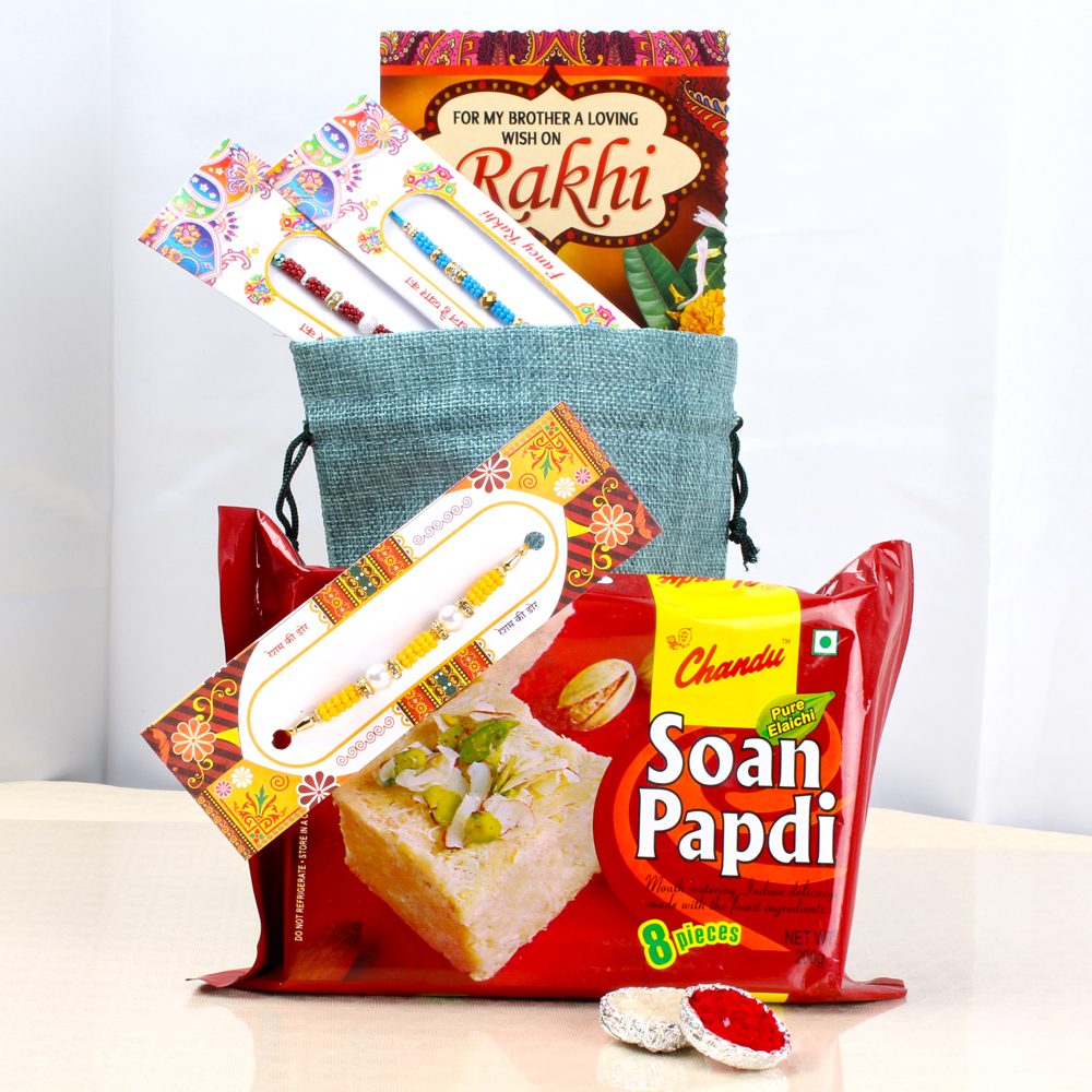 Beautiful Five Rakhis with Soan Papdi