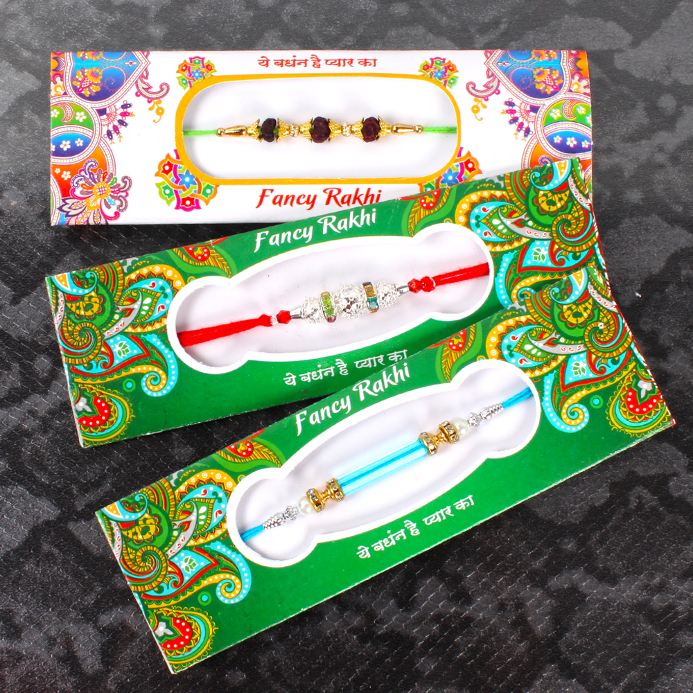 3 Designer Rakhis with Laxmi Ganesh Coin and  Soan Papdi