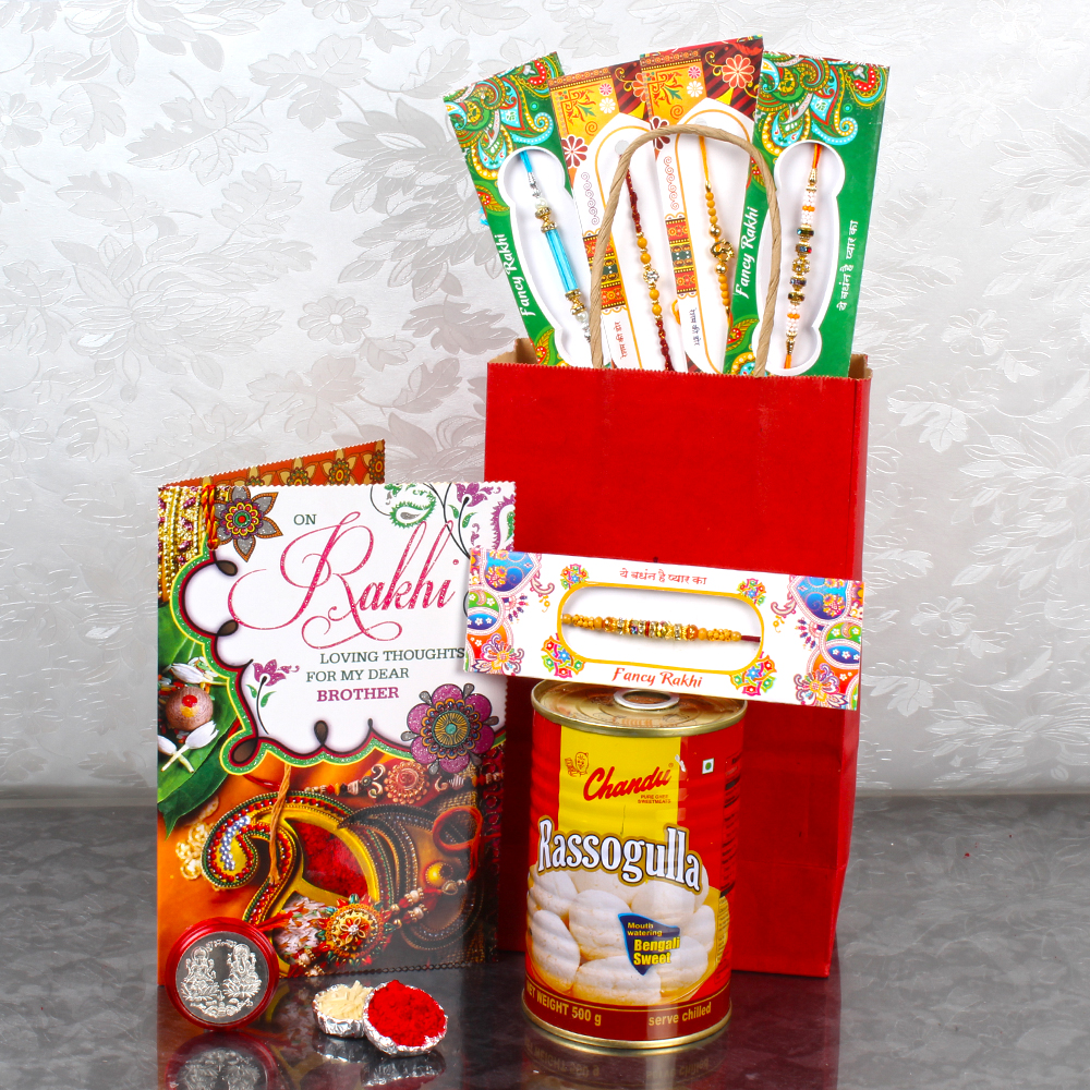 Rakhi Gift Bag of 5 Rakhis and Rasgulla with Laxmi Ganesha Coin