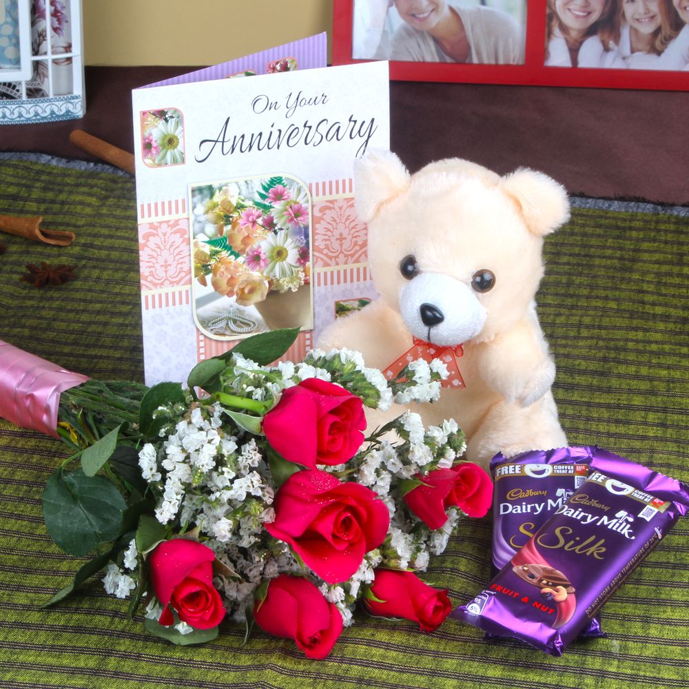 Anniversary Teddy Gift Pack with Six Roses and Silk Chocolates