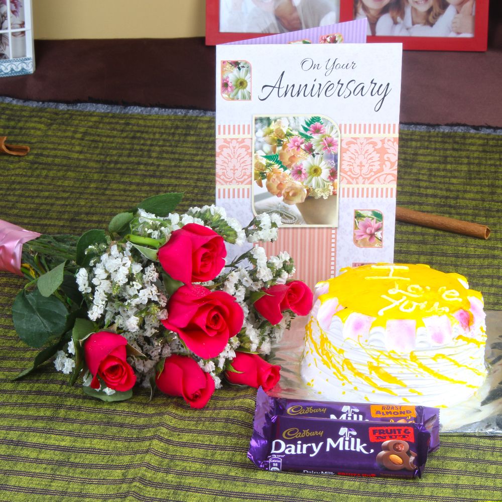 Anniversary Roses with Eggless Cake and Fruit n Nut Chocolates