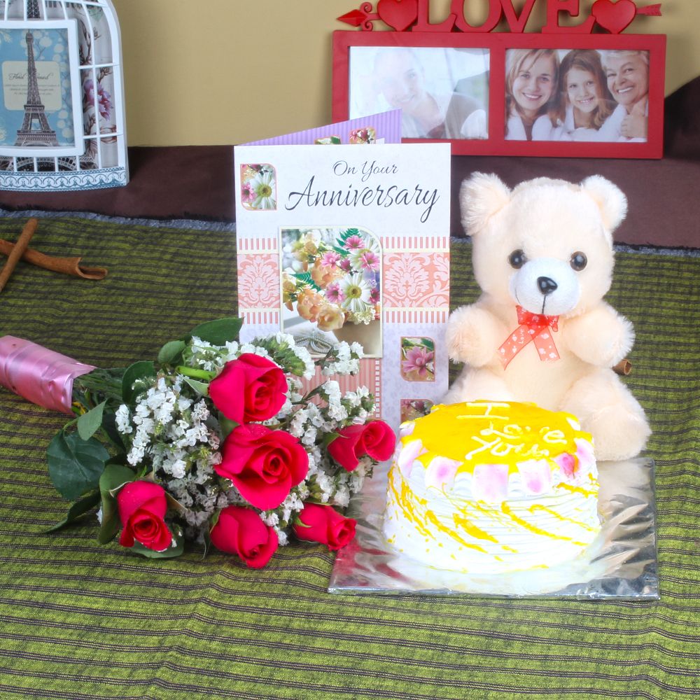 Anniversary Six Red Roses with Eggless Pineapple Cake and Teddy Bear