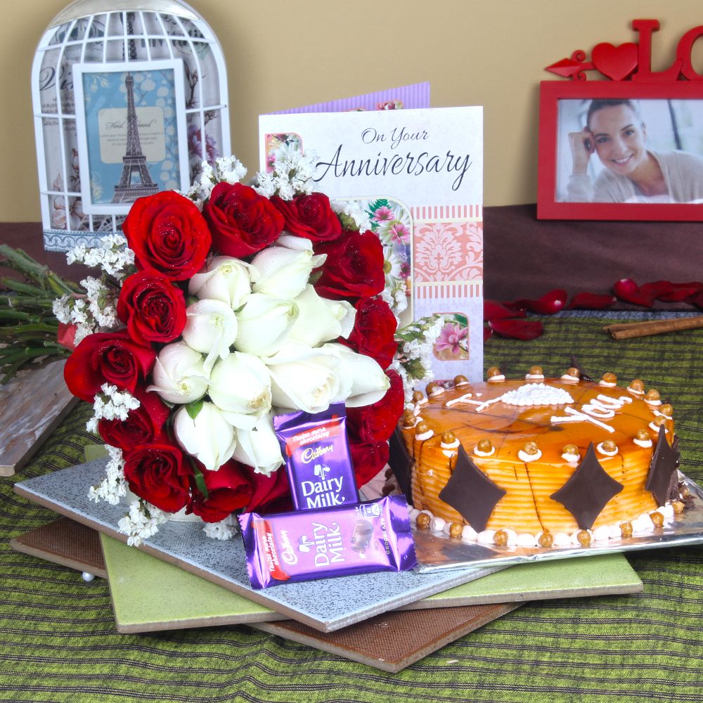 Anniversary Mix Roses Hand Tied Bouquet with Fresh Butterscotch Cake and Dairy Milk Chocolates