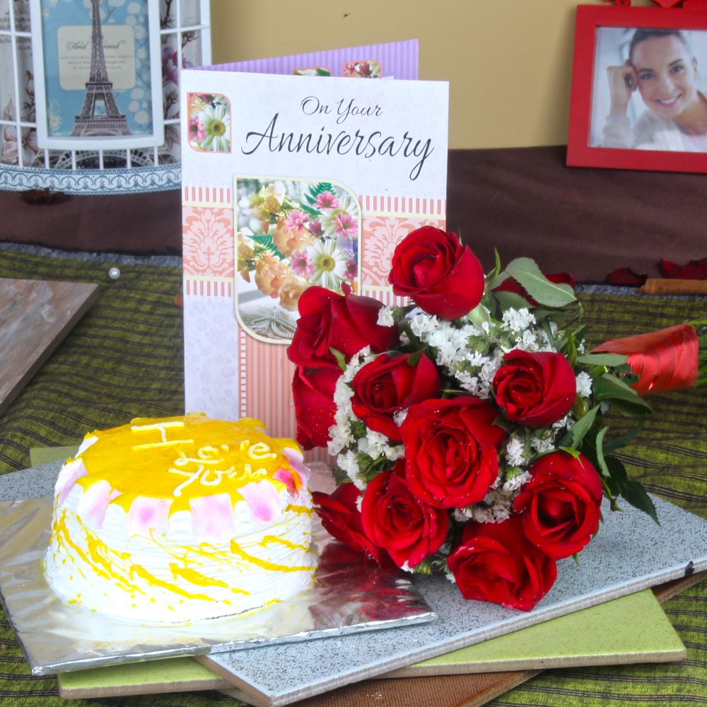 Red Roses Hand Tied Bunch and Pineapple Cake with Anniversary Greeting Card