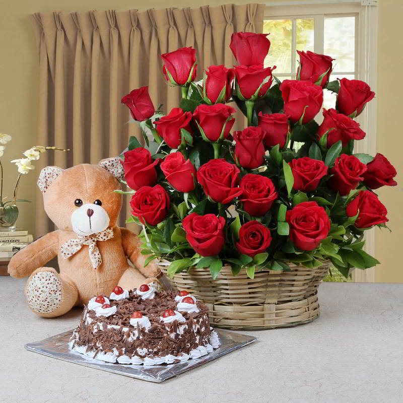 Arrangement of Red Roses and Half Kg Black Forest Cake and Teddy