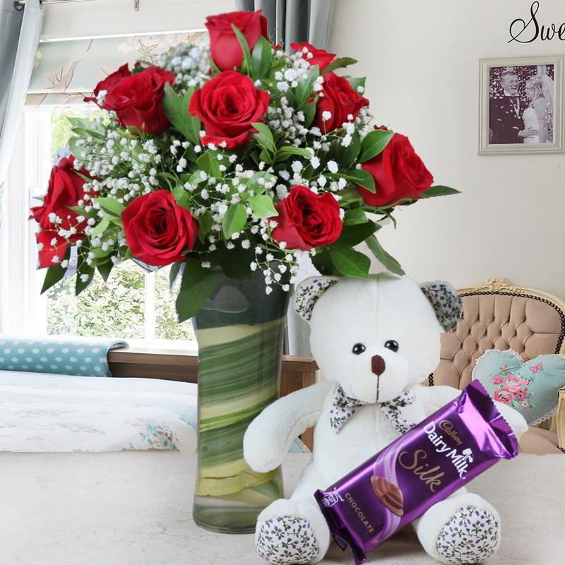 Arrangement of Ten Roses and Cute Teddy with Chocolate