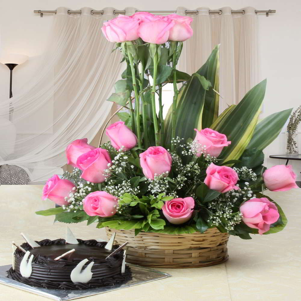 Charming Pink Roses Arranged in Basket with Chocolate Cake