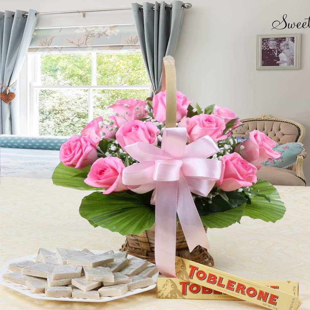 Pink Roses Arrangement with Kaju Katli and Toblerone Chocolates