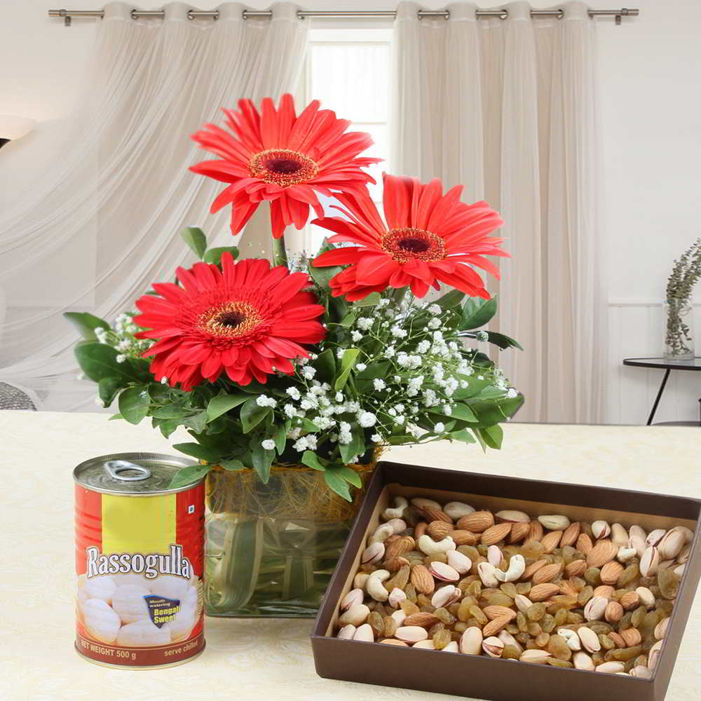 Rasgullas Sweet with Red Gerberas in Vase and Dry Fruits