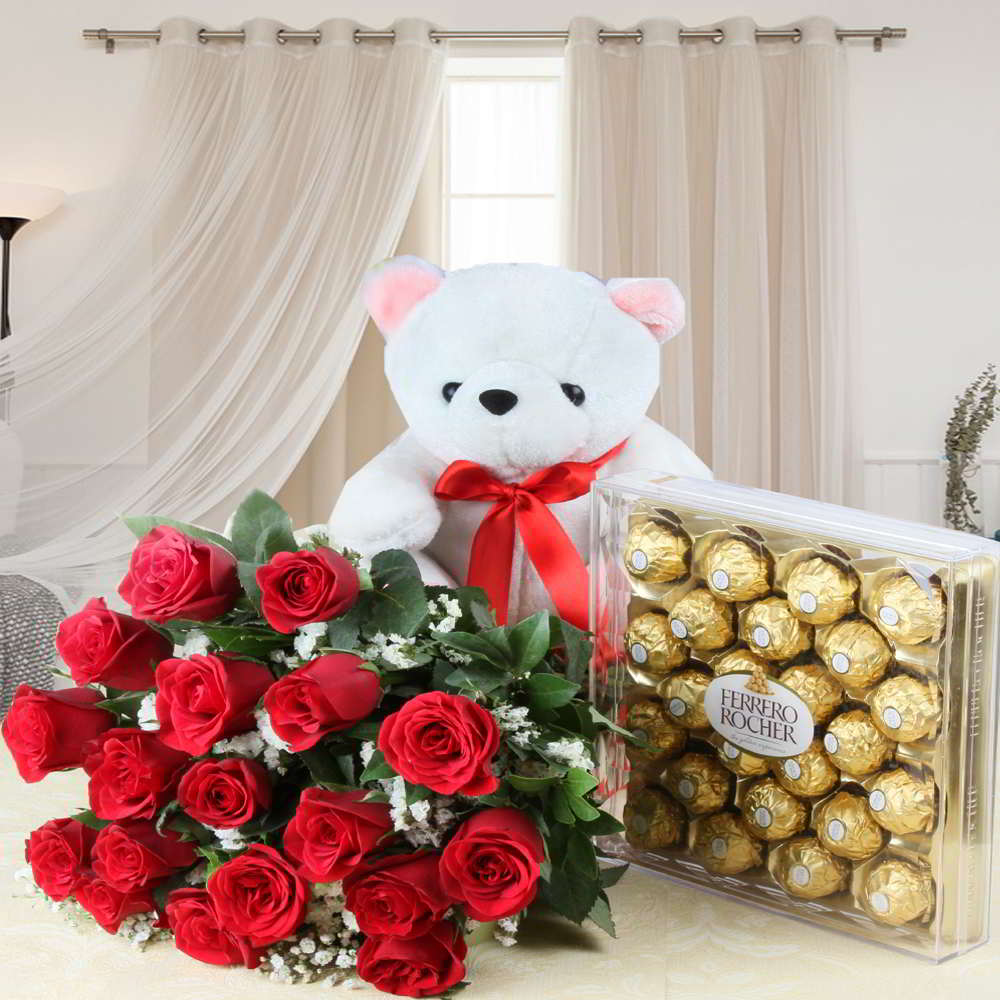 teddy bear with chocolate and roses