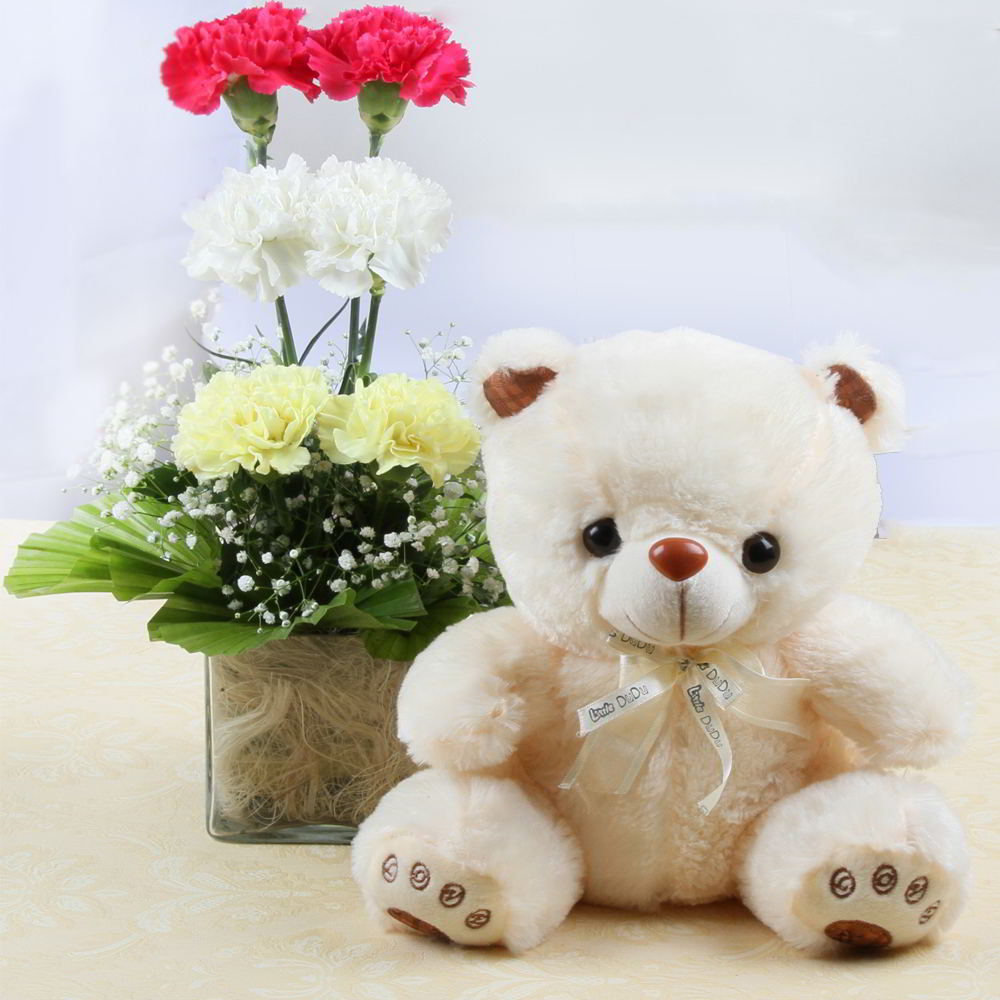 Cute Teddy Bear with Carnations Arrangement