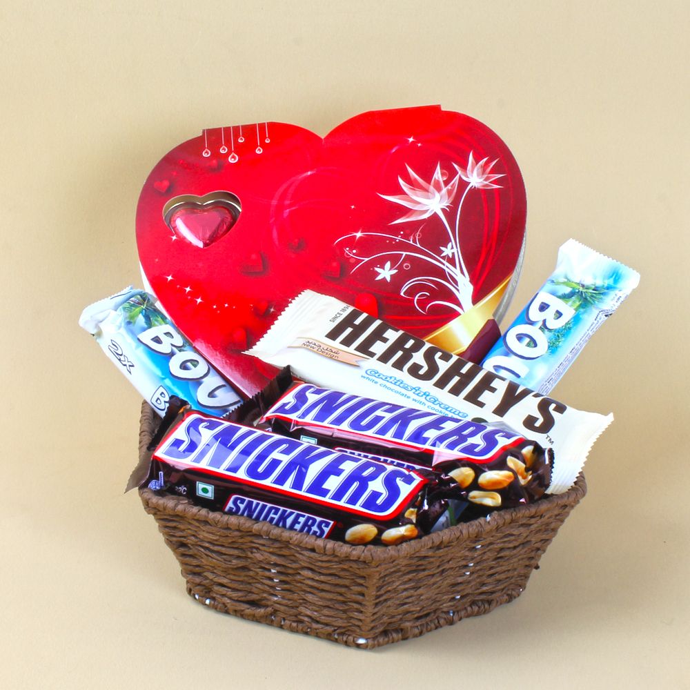 Basket full of Hersheys and Snickers with Heart shape Chocolate Box