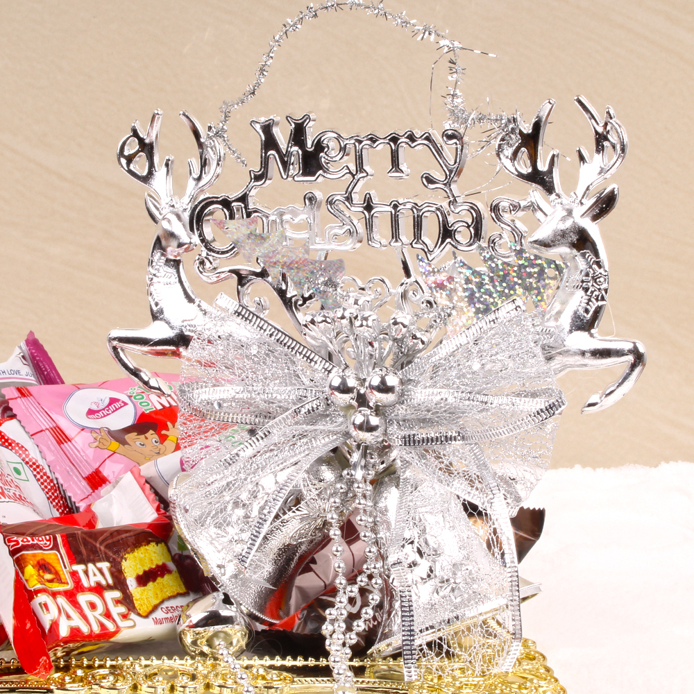Merry Christmas Bell with Cakes and Chocolate in a Tray