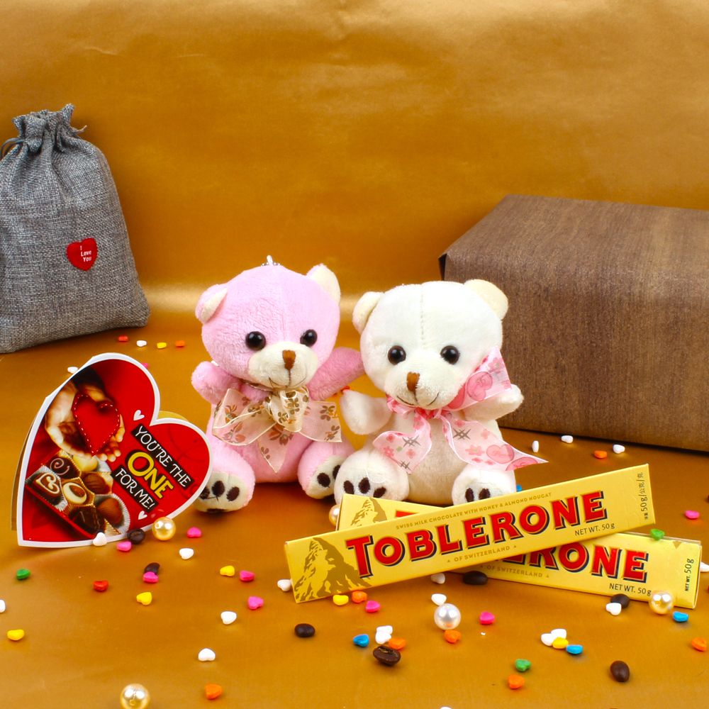 Love Season Combo of Couple Teddy with Toblerone Chocolates and Greeting Card