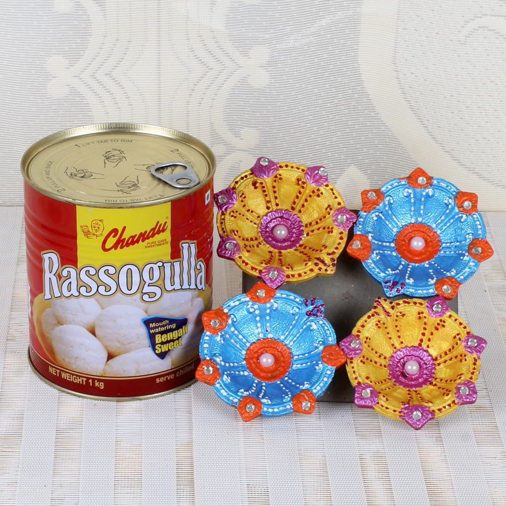 Earthen Diya and Rasgulla Sweets