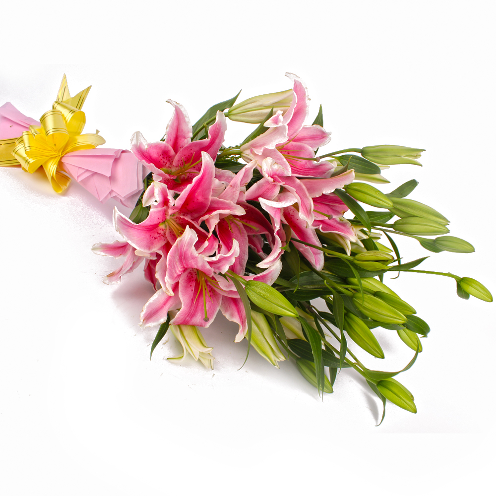 12 Pink Lilies Hand Tied Bunch Tissue Packed