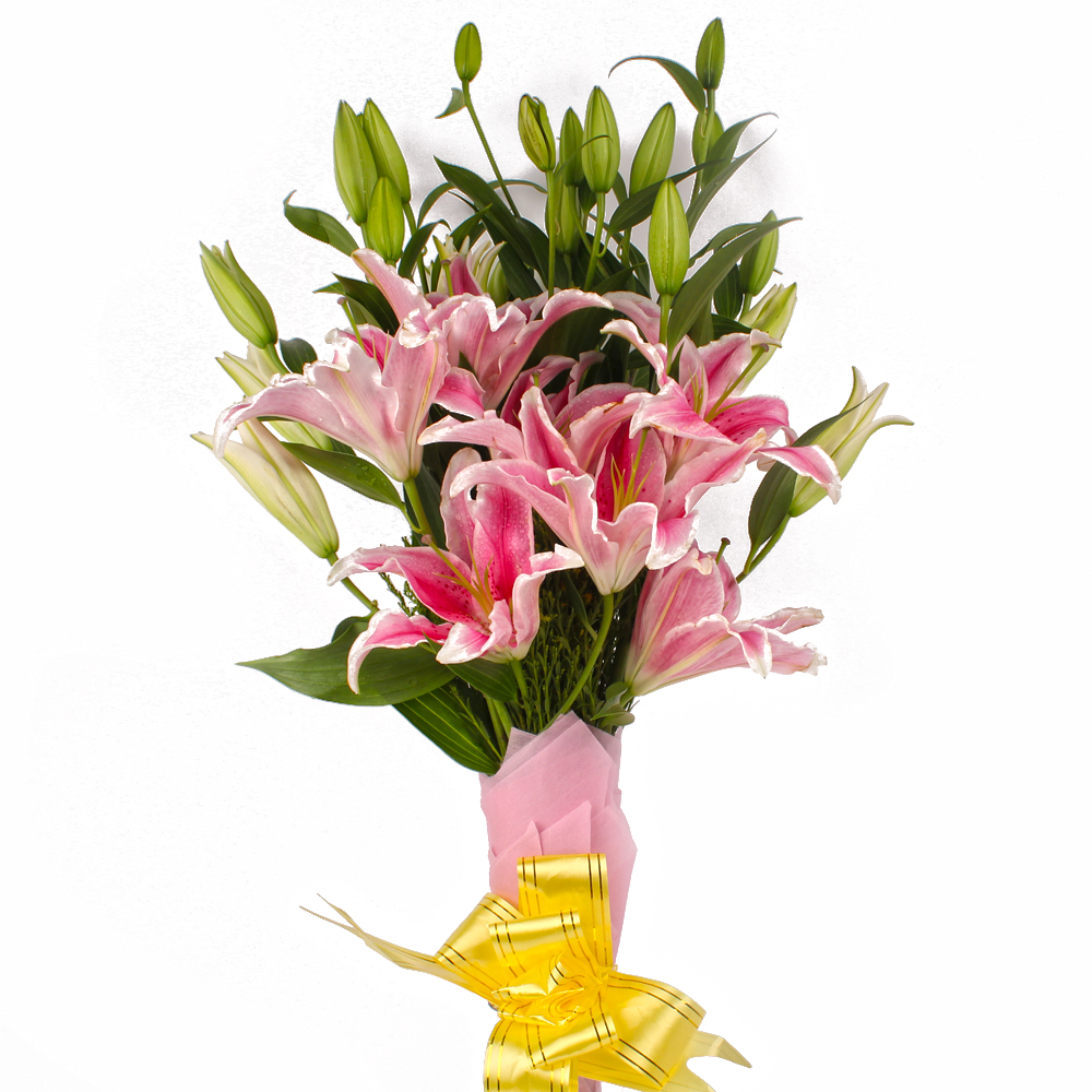 12 Pink Lilies Hand Tied Bunch Tissue Packed