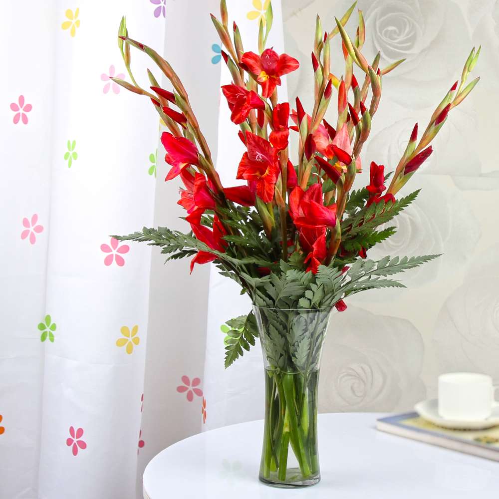 Red Glads in a Glass Vase