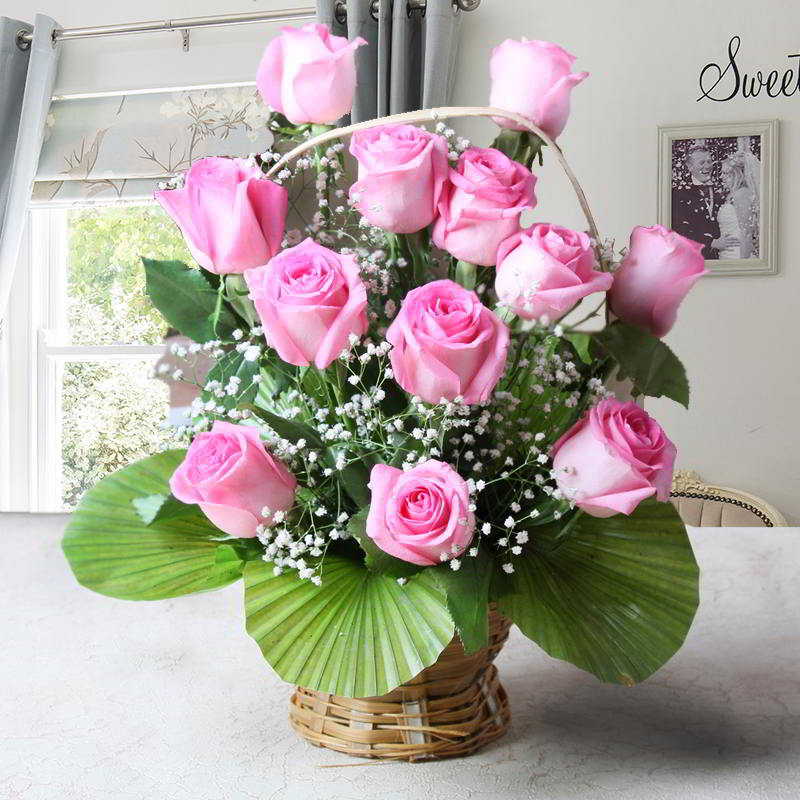 Twelve Pink Roses in a Basket