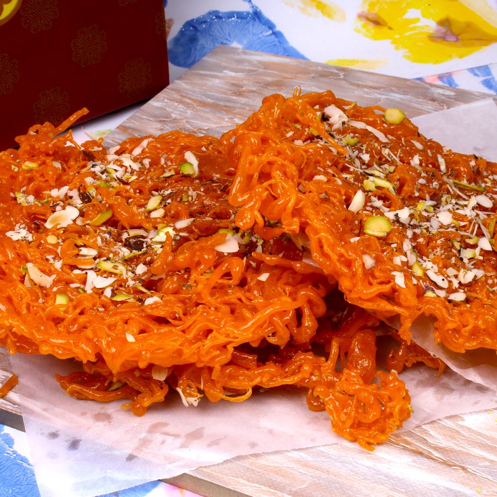Jalebi Ghevar Sweet with Herbal Holi Colors and Masala Cashew Nuts