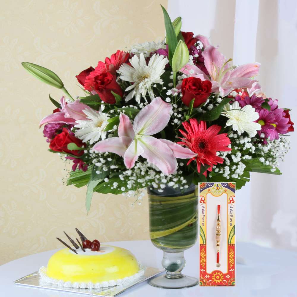 Mix Flowers with Rakhi and Pineapple Cake