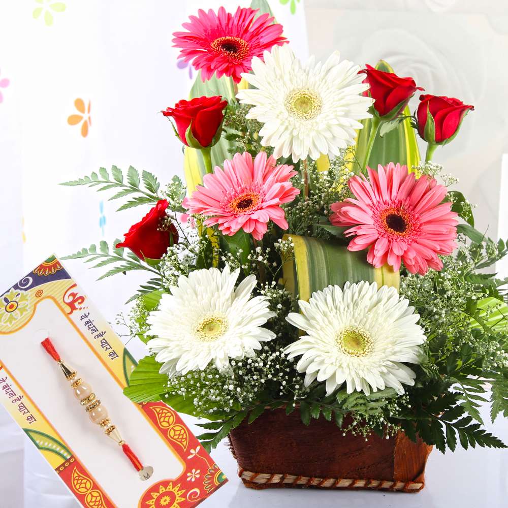 Flowers Arrangement with Attractive Rakhi