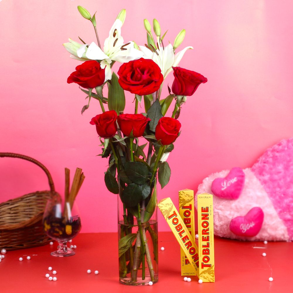 Toblerone Chocolate with Roses and Lilies Arrangement
