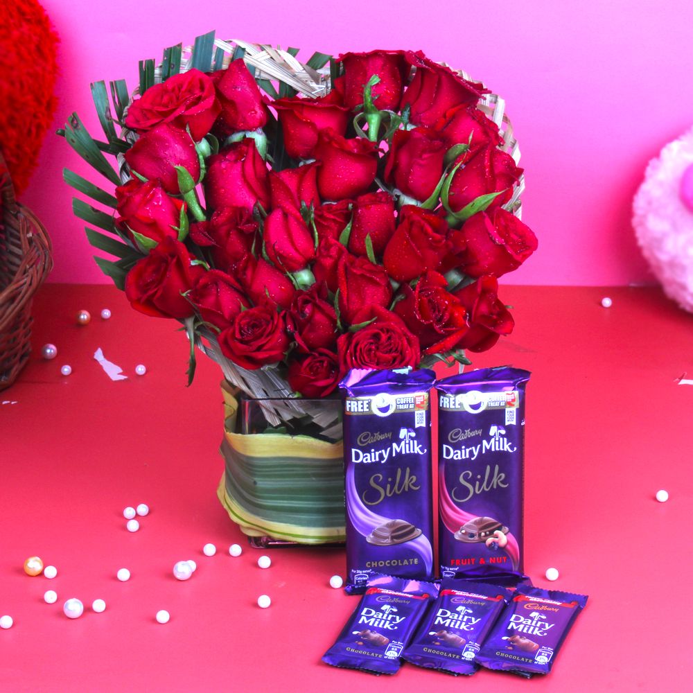 Assorted Cadbury Chocolate with Red Roses Arrangement