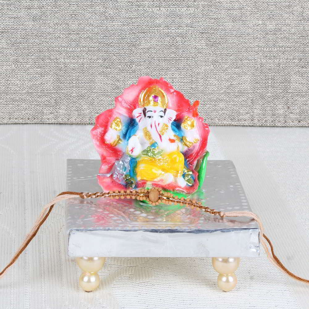 Floral Ganesha Idol with Rakhi-USA