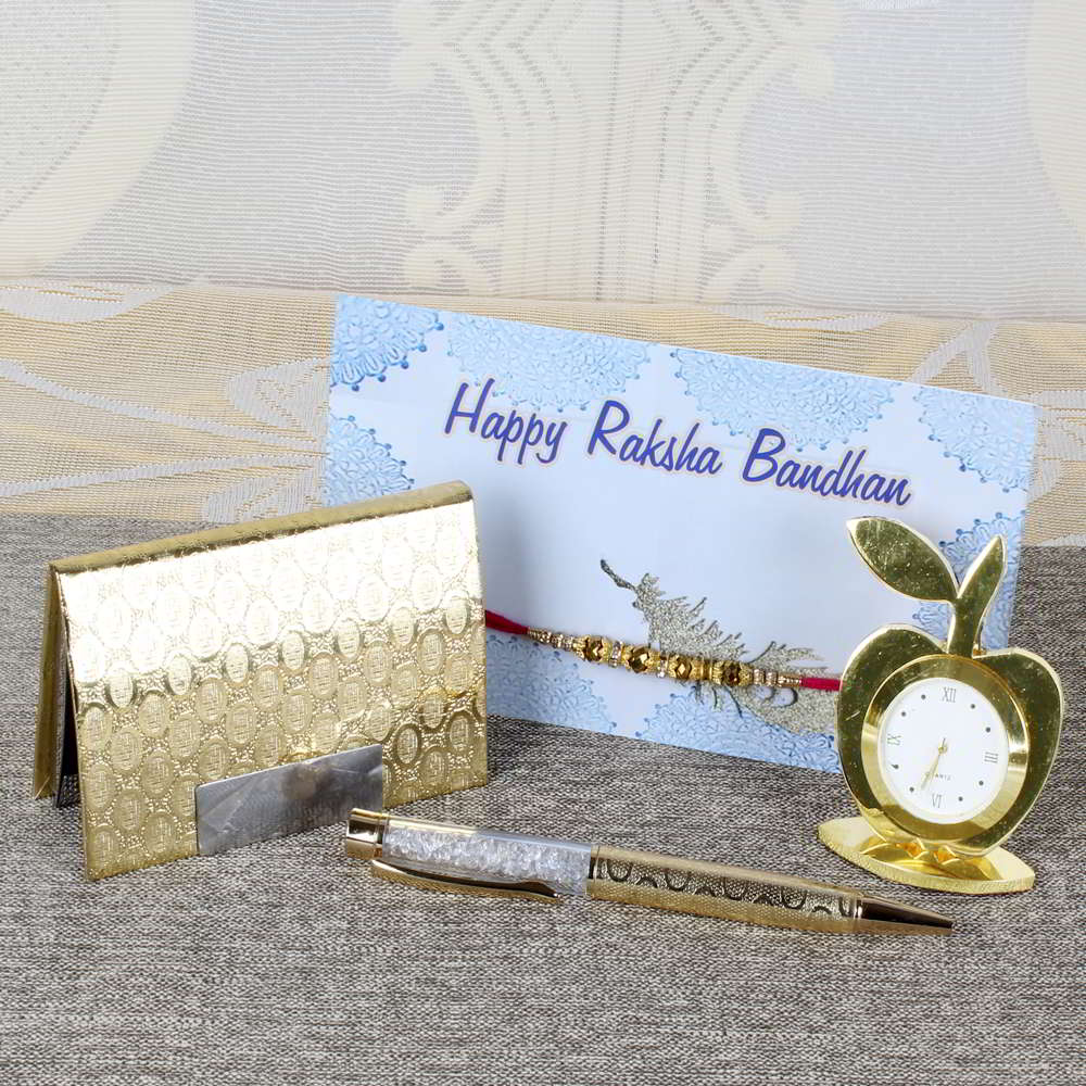 Rakhi Gift of Golden Apple Shape Table Clock with Card Holder and Crystal Ball Pen