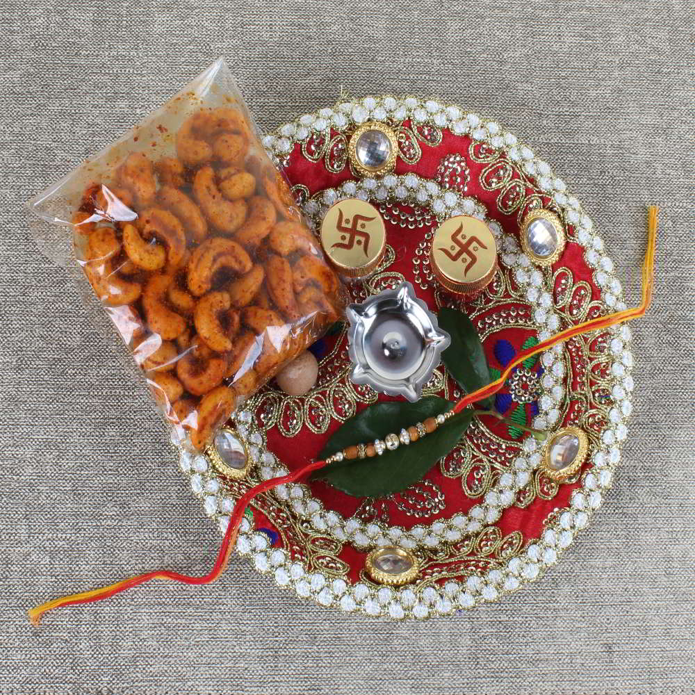 Swastika Rakhi with Masala Kaju in Designer Thali