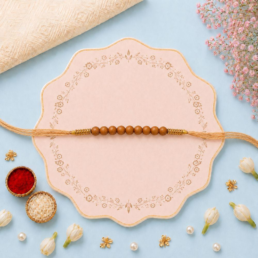 Sandalwood Rakhi with Zardosi work