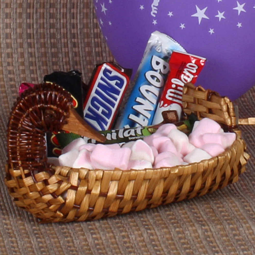 Exotic Basket of Imported Chocolate Marshmallow and Balloon 